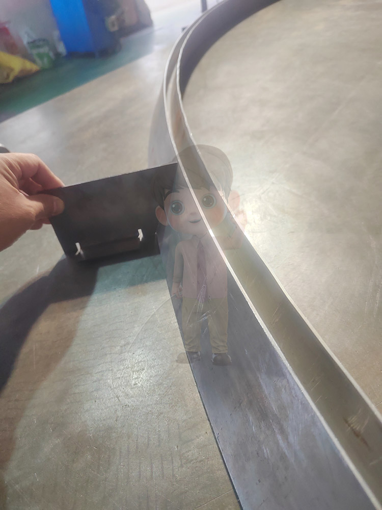 Tensile bending profiled material